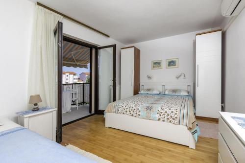 Postel nebo postele na pokoji v ubytování Apartments Istra Croatia