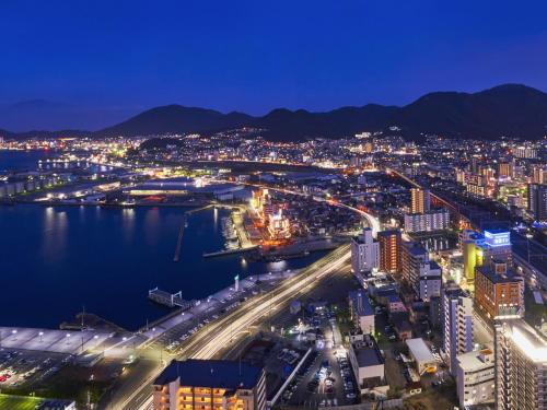 a view of a city at night at Rihga Royal Hotel Kokura Fukuoka in Kitakyushu
