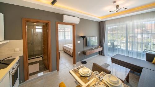 Η κουζίνα ή μικρή κουζίνα στο Midpoint Suites