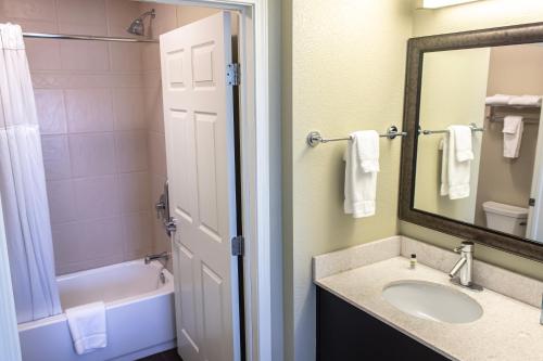 A bathroom at Staybridge Suites Minot, an IHG Hotel