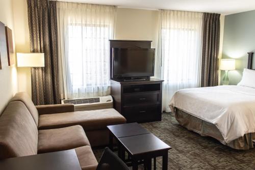 A television and/or entertainment centre at Staybridge Suites Minot, an IHG Hotel