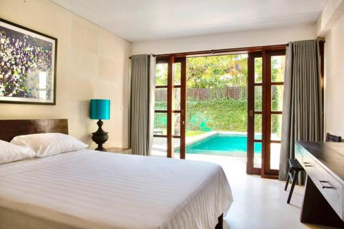 Llit o llits en una habitació de Villa Lola