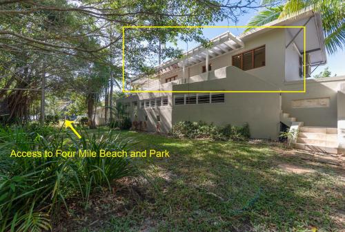 an image of a house with a yellow arrow pointing to a house at Beachside 5 with Ocean glimpses in Port Douglas