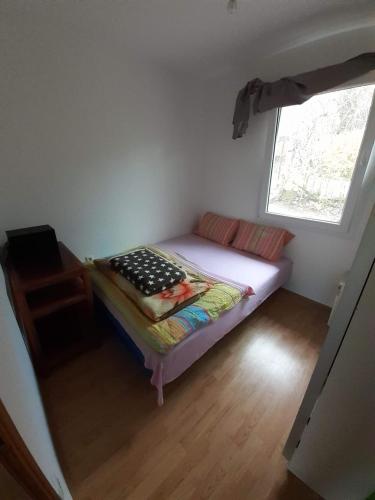 מיטה או מיטות בחדר ב-Vikendica Alibegovac
