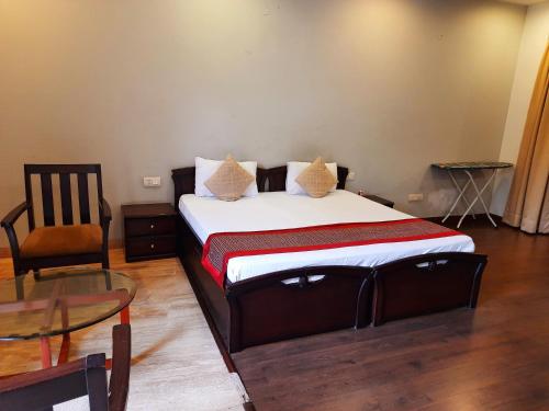 Manor Inn Suites Executive Suiteにあるベッド