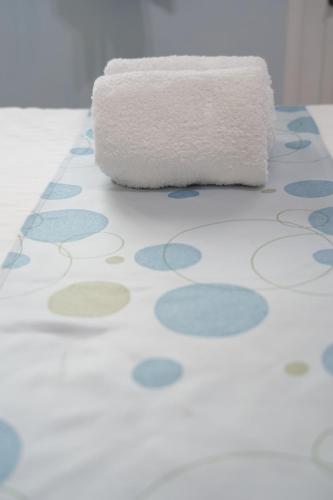 a roll of toilet paper on a bathroom floor at Steps in Taitung in Taitung City
