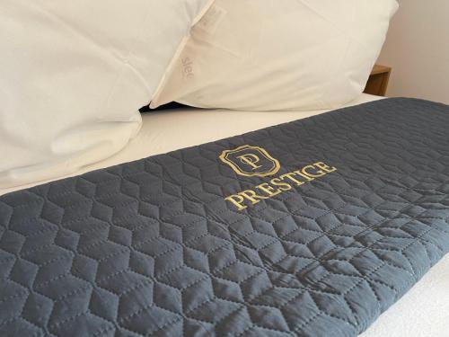 a close up of a mattress on a bed at Prestige Apartment Teslic in Teslić
