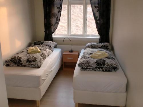 Katil atau katil-katil dalam bilik di Guesthouse Tilraun
