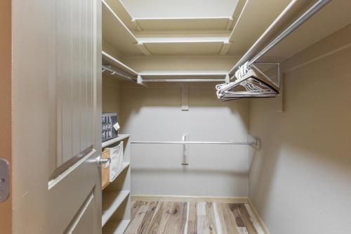 a small kitchen with a refrigerator in a room at 1925 Elkhorn Drive in Ouray
