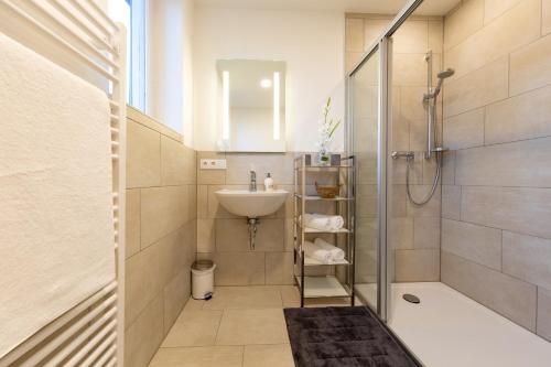 A bathroom at Suiten am Rosenberg