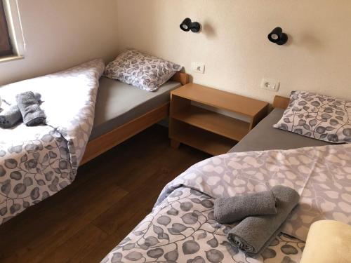 Postel nebo postele na pokoji v ubytování Luna