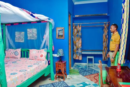 Katil dua tingkat atau katil-katil dua tingkat dalam bilik di Coccobello Zanzibar