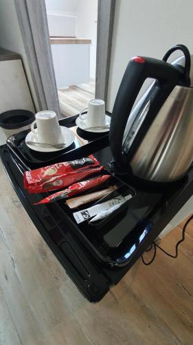 Kemudahan buat kopi dan teh di PATTY Garni