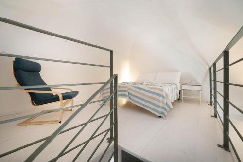 A bed or beds in a room at WePuglia - Dimore Stefania
