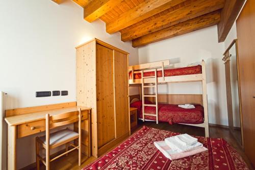 Postel nebo postele na pokoji v ubytování Kapriol