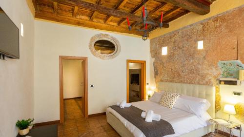 Posteľ alebo postele v izbe v ubytovaní Trastevere Alexander Rental in Rome