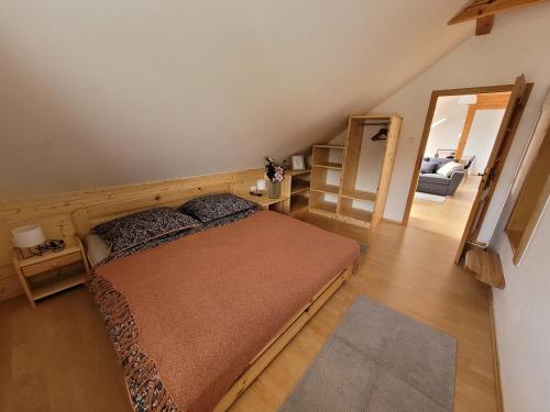 Postel nebo postele na pokoji v ubytování Apartmány Velké Dářko