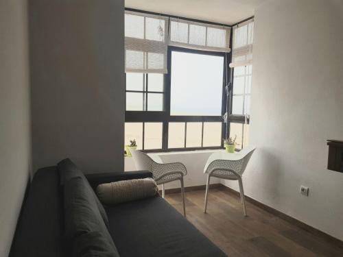 Χώρος καθιστικού στο Apartamentos Cotillo Family