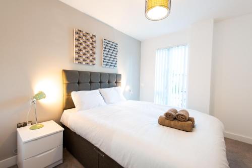 Ένα ή περισσότερα κρεβάτια σε δωμάτιο στο Modern City Living Apartments at The Assembly Manchester