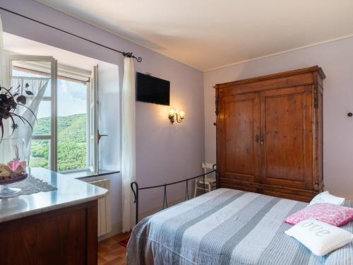 Postel nebo postele na pokoji v ubytování Holiday Home La Felcaia by Interhome