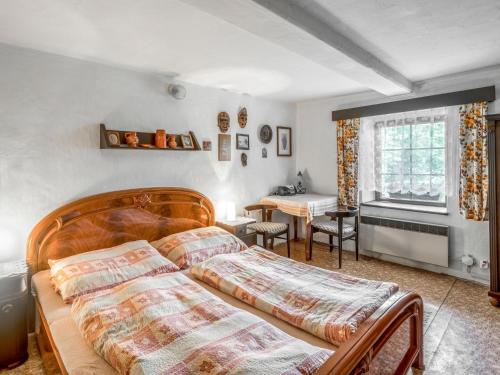 מיטה או מיטות בחדר ב-Holiday Home Újezd Svatého Kříže by Interhome