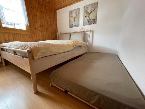 Кровать или кровати в номере Apartment Konkordia 1 by Interhome