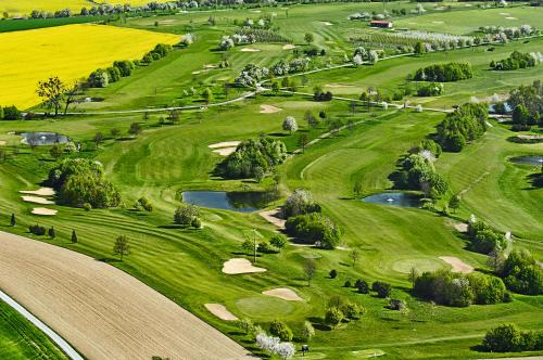 an aerial view of a golf course at Wald & Schlosshotel Friedrichsruhe in Friedrichsruhe