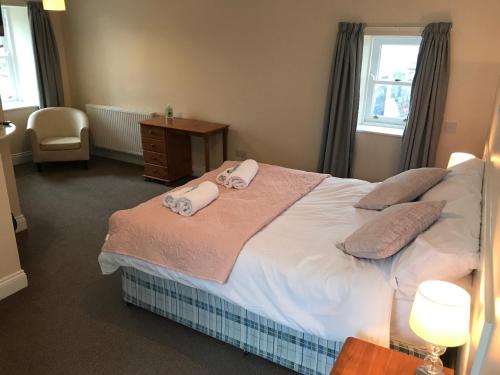 The Maxwell Arms Hotelにあるベッド
