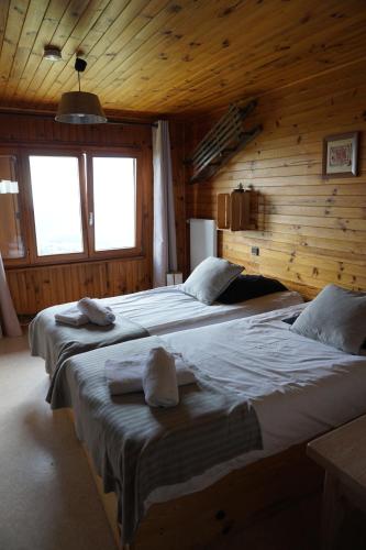 Кровать или кровати в номере Le Schallern - Accès à pieds depuis le Gaschney