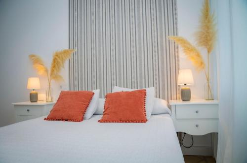 Postel nebo postele na pokoji v ubytování Hostal Restaurante Benalup Golf