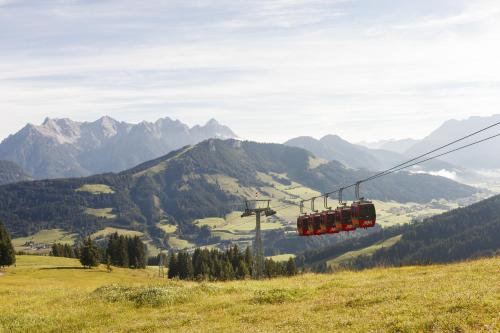 a group of red stop lights on a ski lift at Pension Haus in der Sonne in Fieberbrunn