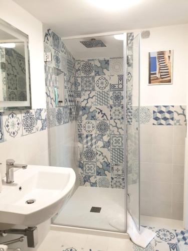 a bathroom with a shower and a sink at Regina Margherita in Positano