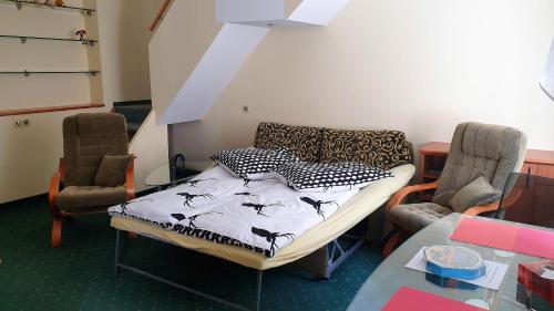 Кровать или кровати в номере SPA Apartment Raisova