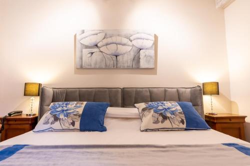 Cama o camas de una habitación en Hotel à l'Oriel