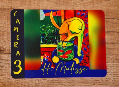 a colorful picture of a skeleton holding a drink at La CASA DEGLI ARTISTI in Tuscania