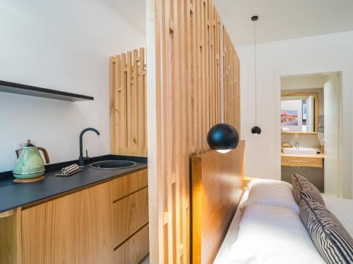 Kuchyň nebo kuchyňský kout v ubytování Design Rooms Verona