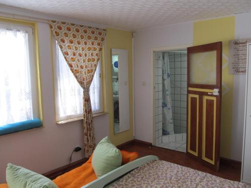 Una cama o camas en una habitación de zum Wiesengrund im Oderbruch