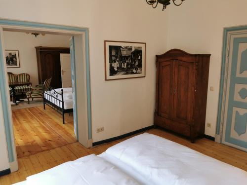 Ένα ή περισσότερα κρεβάτια σε δωμάτιο στο Altstadt Palais
