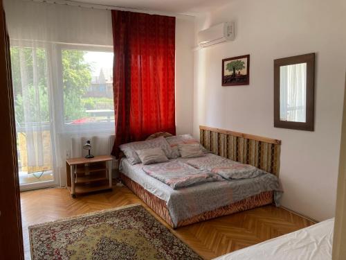 Llit o llits en una habitació de Maria Apartman