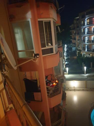 a view of a balcony of a building at night at Golden Dreams in Sunny Beach