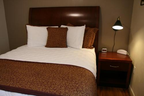 Ліжко або ліжка в номері Affordable Suites Kannapolis