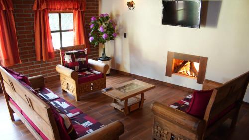 A seating area at CABAÑAS CASTILLO