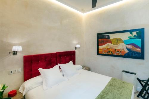 Postel nebo postele na pokoji v ubytování Gadir Suites