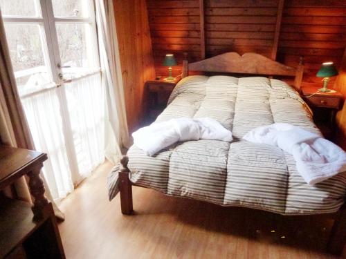 Llit o llits en una habitació de Villa El Radal