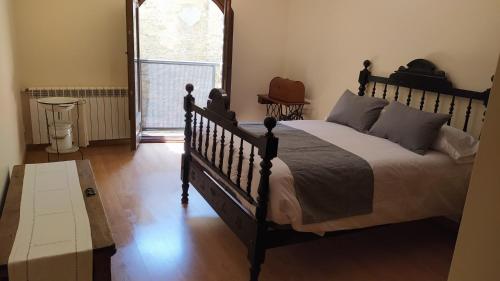 Llit o llits en una habitació de Casa Beta allotjament rural