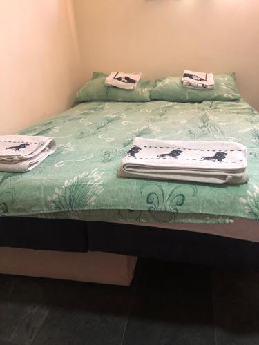 En eller flere senge i et værelse på Apartmani Morava 54