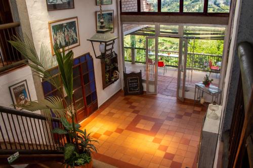 an overhead view of a room with a staircase and aoyer with aoyer at Hotel Villa Palosanto in Jericó