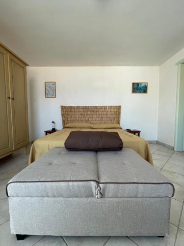 Кровать или кровати в номере Le Stelle