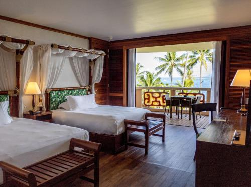 Cama o camas de una habitación en InterContinental Tahiti Resort & Spa by IHG