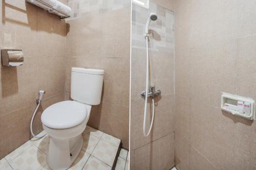 Kylpyhuone majoituspaikassa Capital O 134 Lg Residence